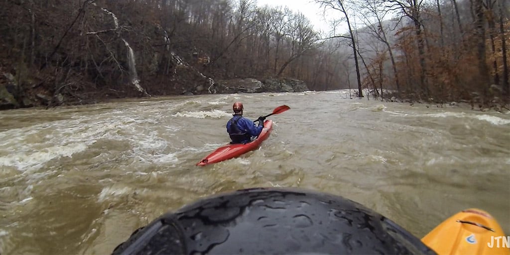 kayaking flooded river